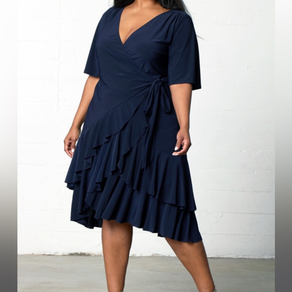 Kiyonna Miranda Wrap Dress - tags still attached. 
Color: Navy
Size: 3X (22-24)